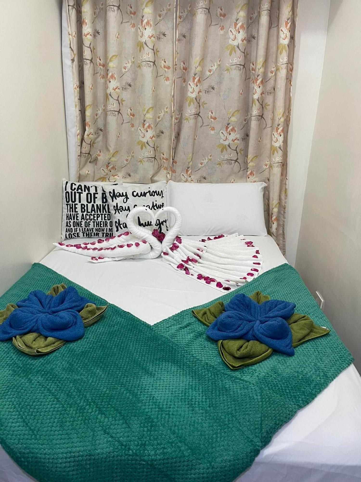 Green Residences Staycation By Pbyy Manila Exterior foto